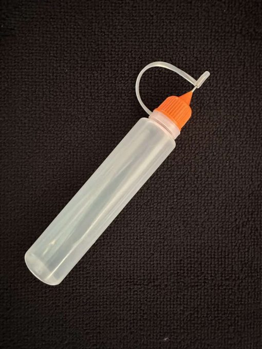 Needlepoint oil bottle